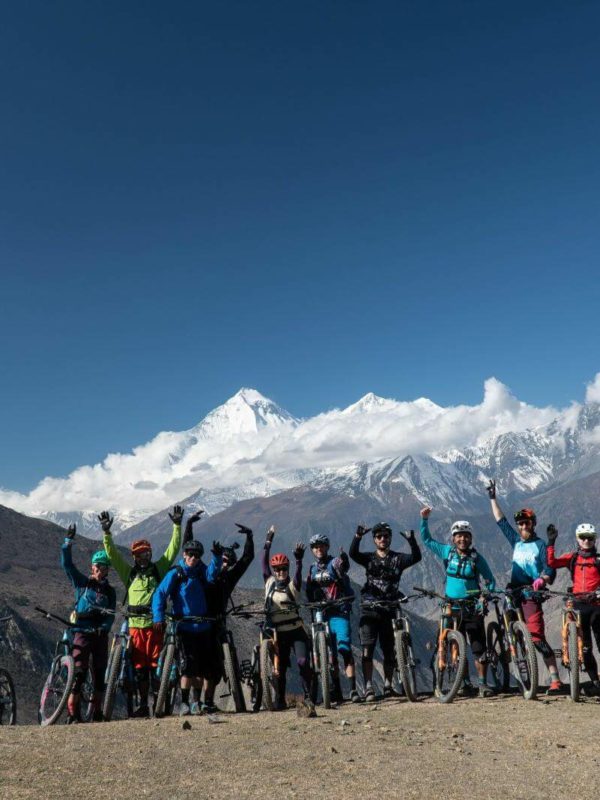 Mountain Bikers in Front of Mountain Range