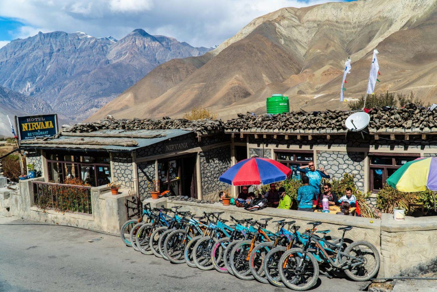 Hopping off the mountain bike for a break at the Hotel & Restaurant, "Nirvana" - which is pretty much what this tour in Nepal equates to!