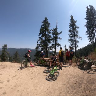 mountain bikers taking a break on freund canyon